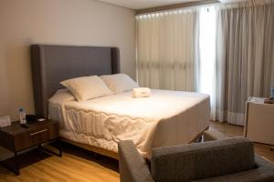 Postel nebo postele na pokoji v ubytování Hotel Village Premium Joao Pessoa