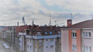 Nespecifikovaný výhled na destinaci Gijón nebo výhled na město při pohledu z apartmánu