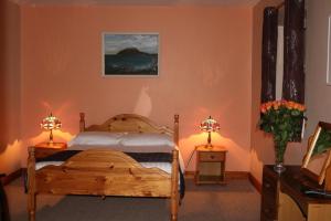 Ένα ή περισσότερα κρεβάτια σε δωμάτιο στο An Portán Guest House