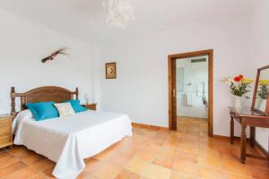 A bed or beds in a room at Hotel Casa Fina - Adults Recommended