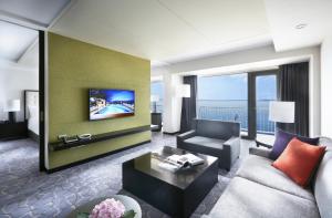 TV a/nebo společenská místnost v ubytování Paradise Hotel Busan