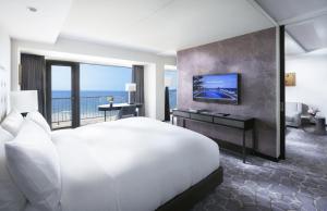 TV a/nebo společenská místnost v ubytování Paradise Hotel Busan