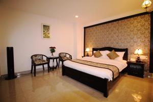 Letto o letti in una camera di Royal Dalat Hotel