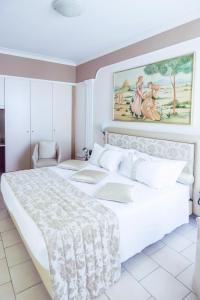 Łóżko lub łóżka w pokoju w obiekcie Best Western Hotel Libertà