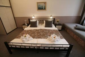 Postel nebo postele na pokoji v ubytování Anette Hotel