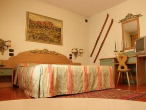 Een bed of bedden in een kamer bij Residence Meuble' Cortina