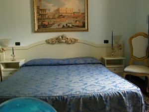Postel nebo postele na pokoji v ubytování Residence Meuble' Cortina