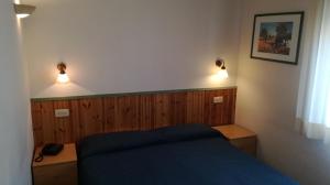 Postel nebo postele na pokoji v ubytování Albergo Le Rose