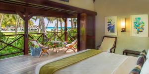 Postel nebo postele na pokoji v ubytování Paradise Sun Hotel Seychelles