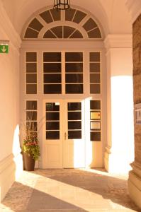 The facade or entrance of Gästehaus im Priesterseminar Salzburg