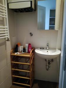 Ванна кімната в Le petit appartement