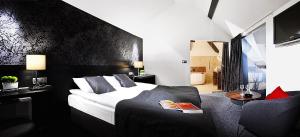 Łóżko lub łóżka w pokoju w obiekcie Hotel Remes