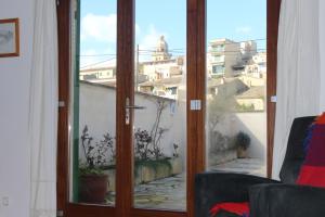 a sliding glass door with a view of a balcony at Dau 39 in Montuiri +19 photos