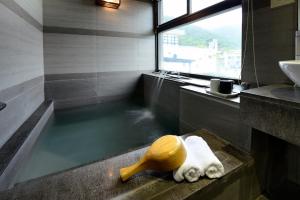 Fotografie z fotogalerie ubytování 松語墅溫泉居 Pine Hot Spring v destinaci Ťiao-si