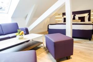 Posezení v ubytování Hotel Merkur - Superior