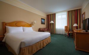 
Кровать или кровати в номере Отель Марриотт Москва Гранд
