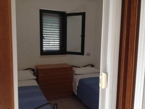 Postel nebo postele na pokoji v ubytování VIOLA Club Village & Camping