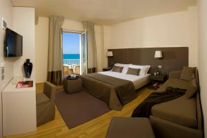 TV a/nebo společenská místnost v ubytování Hotel Miramare