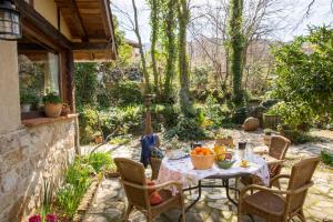 Vonkajšia záhrada v ubytovaní Casa Rural la Casa del Bosque