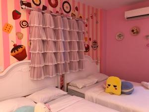 Postel nebo postele na pokoji v ubytování Fantasy Hotel