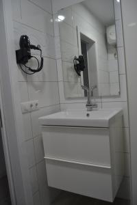 Ванная комната в ENJOY CANTERAS Apartamento +24 фотографии