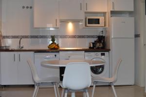 Kuchyňa alebo kuchynka v ubytovaní Apartamento Ancla 26 + 9 fotografií