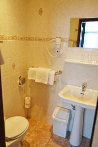 Koupelna v ubytování Hotel Bienvenue