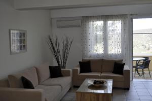Predel za sedenje v nastanitvi Treehouse Holiday Homes