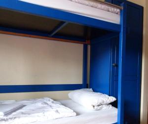 Kolping Hostel Trier im Warsberger Hof客房内的一张或多张床位
