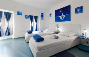 Posteľ alebo postele v izbe v ubytovaní Old City Rooms + 30 fotografií