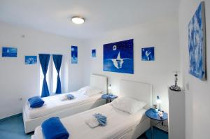 Posteľ alebo postele v izbe v ubytovaní Old City Rooms