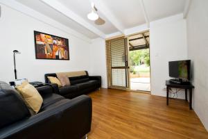 TV a/nebo společenská místnost v ubytování Peppermint Brook Cottages + 7 fotografií