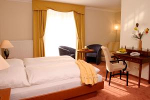 Voodi või voodid majutusasutuse Hotel Florianerhof toas