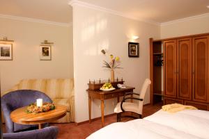 Postel nebo postele na pokoji v ubytování Hotel Florianerhof + 19 fotografií