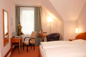 Voodi või voodid majutusasutuse Hotel Florianerhof toas