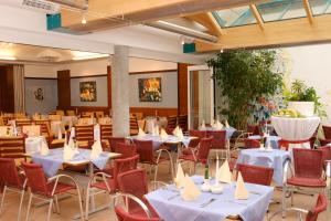 Restoran või mõni muu söögikoht majutusasutuses Hotel Florianerhof