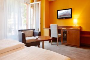 Letto o letti in una camera di Montfort - das Hotel