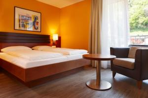 Letto o letti in una camera di Montfort - das Hotel