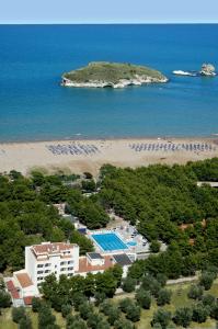 an aerial view of a resort and a beach at Hotel Portonuovo in Vieste