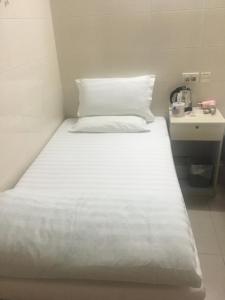 Postelja oz. postelje v sobi nastanitve Unique Hostel
