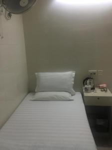 Postelja oz. postelje v sobi nastanitve Unique Hostel