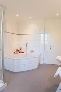 Koupelna v ubytování Boutiquehotel Goldene Rose - self-check-in