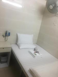 Postelja oz. postelje v sobi nastanitve Unique Hostel