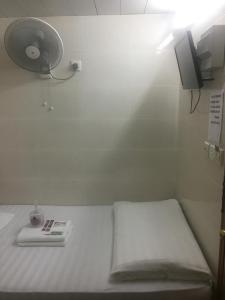Postelja oz. postelje v sobi nastanitve Unique Hostel