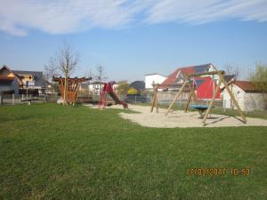 a park with a bunch of playground equipment at Luba Rube in Rust