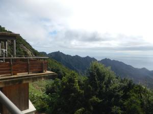 a balcony of a building with mountains in the background at Albergue Montes de Anaga in El Bailadero