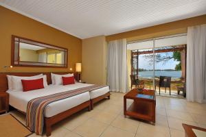 Кровать или кровати в номере Shandrani Beachcomber Resort & Spa