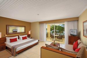 Кровать или кровати в номере Shandrani Beachcomber Resort & Spa