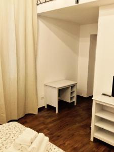 Łóżko lub łóżka w pokoju w obiekcie B&B Sant'Agostino