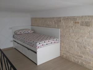 Łóżko lub łóżka w pokoju w obiekcie B&B Sant'Agostino